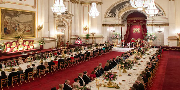 Table linen by Richard Haworth laid in the State Dining Room at Buckingham Palace for a Royal State Visit
