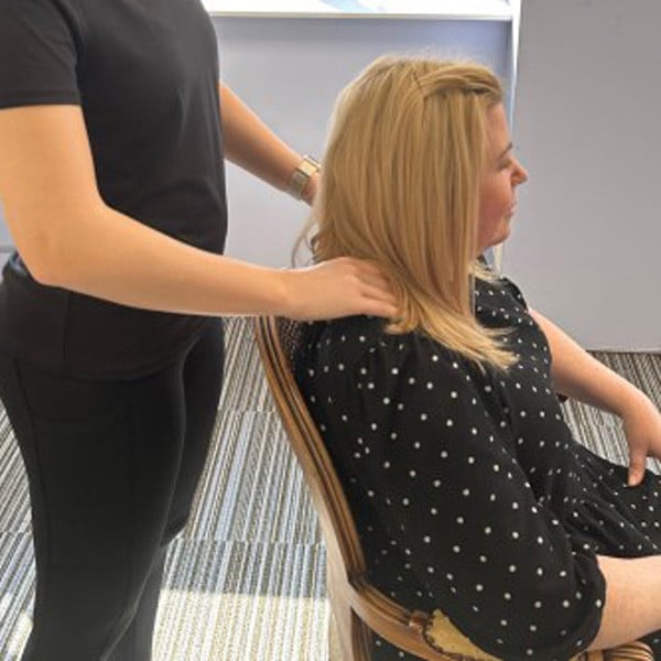 Staff taking part in a yoga and movement session